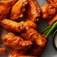 12 Dragon Wings, Ultimate Crispy Fries And 1 Soda · 12 pieces tossed in your choice of sauce, Gluten-free. choice of honey chipotle, buffalo sau...