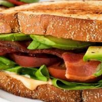 Blta Sandwich · Smoked slab bacon, lettuce, tomato, avocado, pickles, chipotle aioli. Choice of ultimate cri...