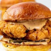 Crispy Chicken Sandwich · Organic chicken breast battered and fried, avocado, arugula, pickles, and chipotle aioli. Ch...