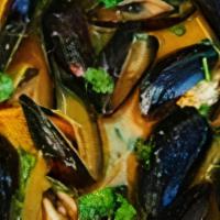 Thai Mussels · Wild organic PEI mussels, red Thai curry - mild spicy, coconut cream sauce served with fries...