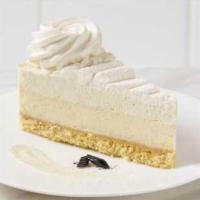Vanilla Bean Cheesecake · Layers of creamy Tahitian vanilla bean cheesecake, white chocolate vanilla mousse, finished ...
