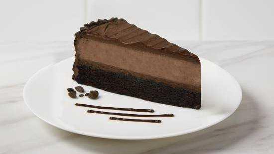 Hershey’S® Cheesecake  · Hershey’s® chocolate cake, layered with chocolate ganache and chocolate cheesecake, finished with chocolate icing.