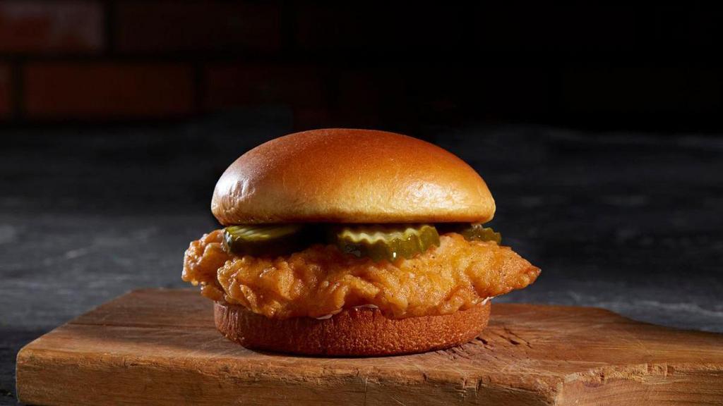 Southern Chicken Sandwich · A 5 oz deep-fried chicken breasts, crunchy pickle chips, and mayonnaise on a potato brioche bun.