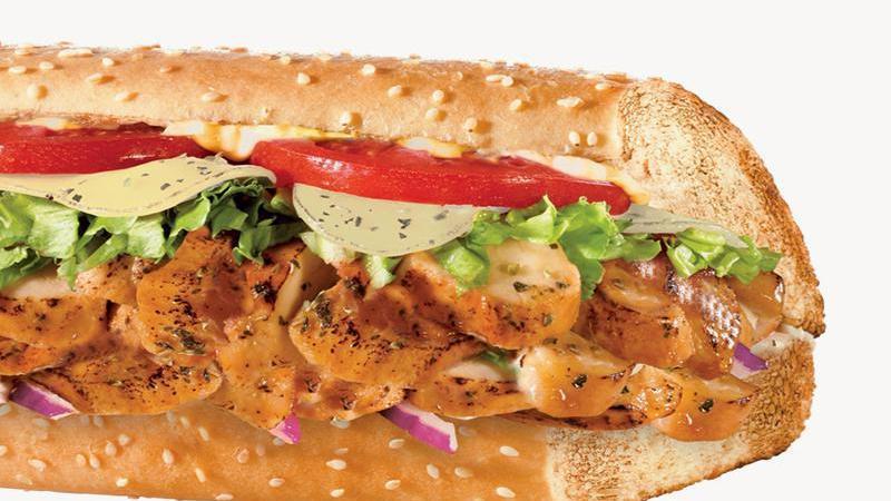 Honey Mustard Chicken Sub · Oven roasted chicken breast strips, bacon, swiss cheese, tomato, red onions, and shredded lettuce with a honey mustard dressing.