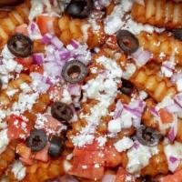 Greek Fries · Your choice of fries, feta, black olives, diced tomatoes, and Greek feta dressing.