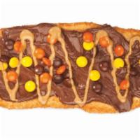 Triple Trip™ · Chocolate hazelnut spread, peanut butter & Reese's Pieces® candies