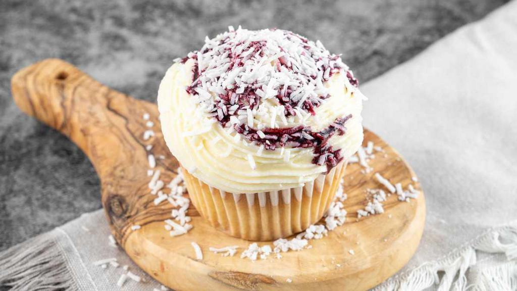 Blueberry Cheesecake Cupcake · Vanilla Cake - Cream Cheese Frosting - Blueberry Filling