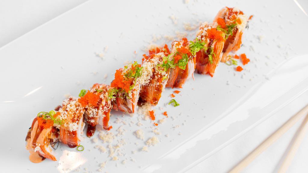 New Kani · Crunch spicy tuna topped with crab meat, scallion, masago spicy sauce.