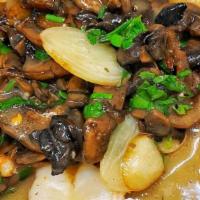 Gamberi E Funghi Antipasto · Shrimp and mushrooms sautéed in a rosemary herb sauce.