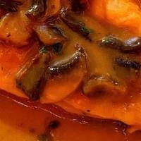 Pollo Marsala · Served with mushrooms in marsala wine sauce.