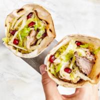 Duck Shawarma · Four mini duck magret & chicken Shawarmas with fig jam, green onion, and garlic whip