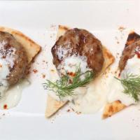 Lamb Kofte · Grilled lamb patties with grilled pita bread and tzatziki sauce.