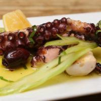 Grilled Spanish Octopus · Celery, Kalamata olives, fresh lemon juice, and red pepper flakes.