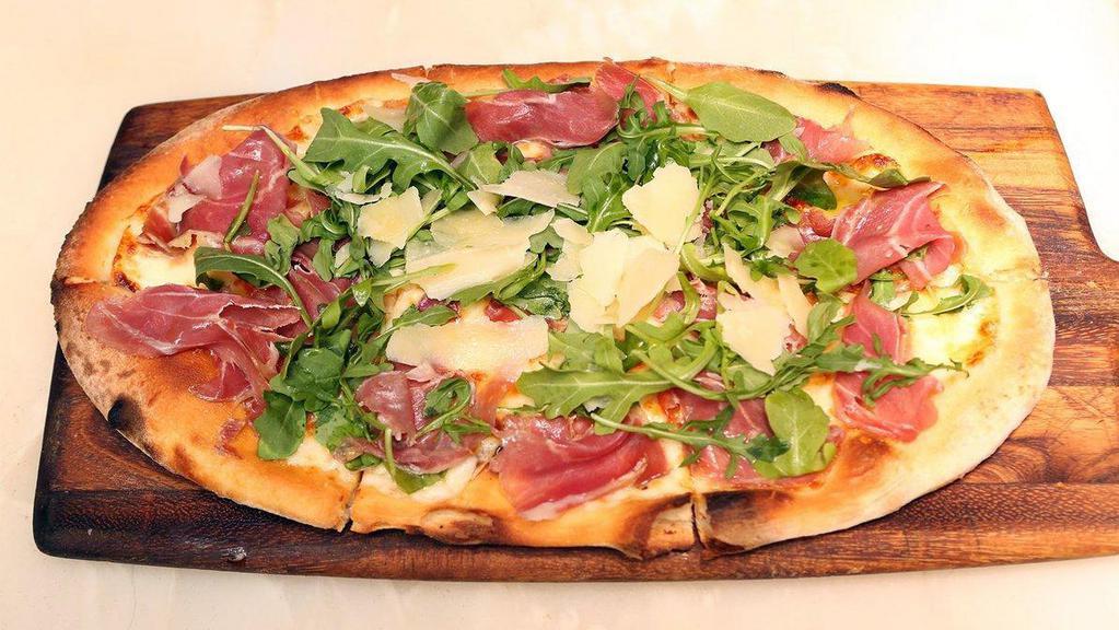 Prosciutto Pizza · Cherry tomatoes, mozzarella, Parma prosciutto, arugula and Parmesan.
