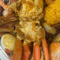 Jj'S Festival · 1 lb snow crab, 1/2 lb shrimp (no head), 1/2 lb sausage, 2 pieces corn, 2 pieces eggs, 3 pie...