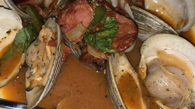 Steamed Clams · Top neck with peppers onions, chorizo, sherry wine sauce.