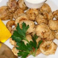 Calamari · Lightly fried calamari, served with garlic lemon yogurt sauce.