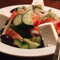 Horiatiki · Gluten free. Vegetarian. Traditional Greek salad with tomatoes, cucumbers, peppers, onions, ...