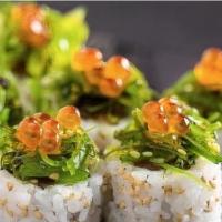 Wakame Seaweed Roll · avocado, cucumber & seaweed salad on the top with sushi sauce.