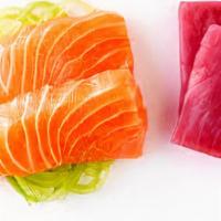 Tuna/ Salmon Sashimi · Four tuna, four salmon,  pieces.