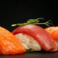 Two Tone Nigiri · Four  pieces  salmon nigiri, three  pieces  tuna nigiri.