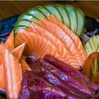 Chirashi Poppy Bowl · Salmon, tuna, edamame, tamago, avocado.