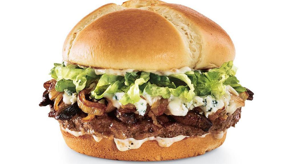 Black & Bleu · Sautéed and blackened portobello mushrooms, caramelized onions, creamy cheese sauce, Bleu cheese crumbles, lettuce and roasted garlic aioli on a toasted brioche bun.