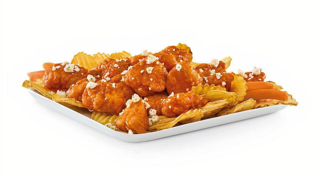 Red'S Bold Boneless Wings · All-white meat boneless wings with your choice of sauce, served on a bed of Yukon kettle chips.