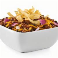 Red’S Chili Chili™ · Ground beef simmered with spices, beans and peppers. Topped with Cheddar, red onion and tort...