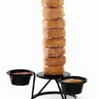  Cinnamon Sugar Towering Doh! Rings® · Eight cinnamon and sugar croissant donut rings served with caramel and fudge.