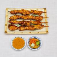 Satay · (4pcs) Chicken or beef grilled on skewers with peanut sauce.