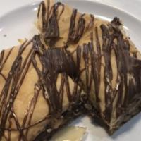 Chocolate Baklava · Flaky layers of crispy filo sheets filled with chocolate, nuts and soaked in honey.