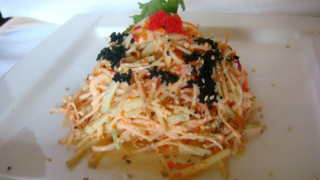 Spicy Crab Salad · Crab and cucumber with spicy sauce.