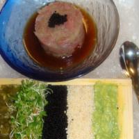 Toro Tartar · Fatty tuna, caviar, mix green with wasabi ponzu sauce.