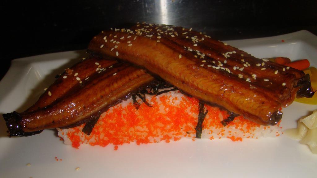 Unagi Don · Eel on bed of sushi rice. Served with miso soup.