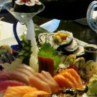 Love Boat For Two · 10 pieces sushi, 15 pieces sashimi, and 3 rolls. Served with miso soup.