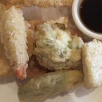 Tempura Appetizer · Fried lightly battered shrimp and vegetables with chef's style tempura sauce.