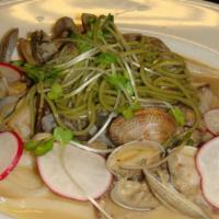 Baby Clam · Sauteed baby clams and japanese mushrooms on a bed of udon noodles.