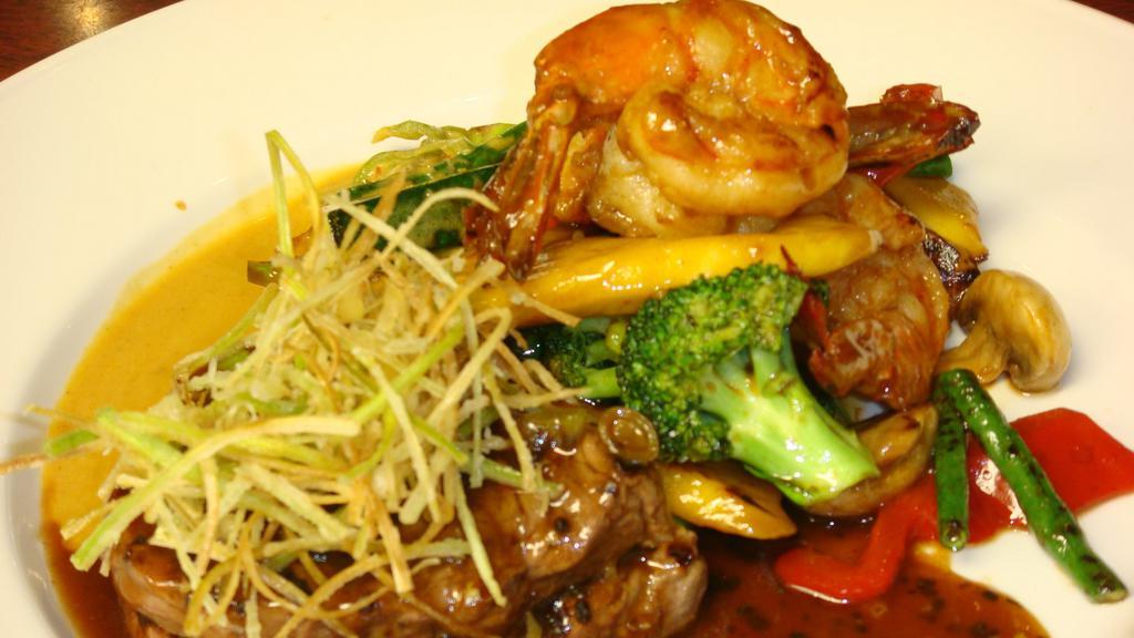 Grilled Filet Mignon With Gulf Shrimp · Served with ginger rice wine sauce.