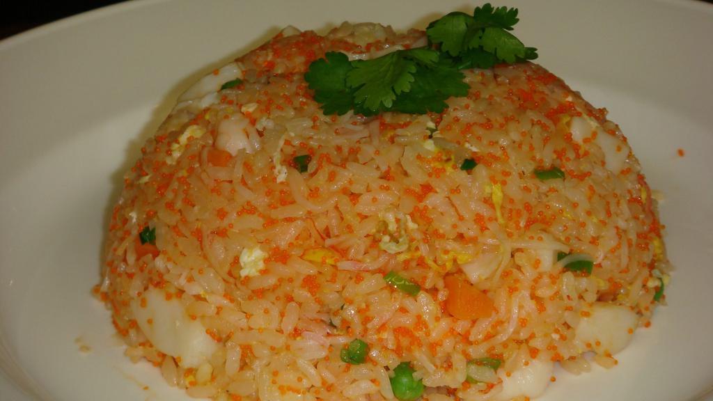 Seafood Fried Rice · Shrimp, scallop, crab meat, vegetable and caviar.