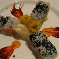 Ninja · Spicy yellowtail, avocado and tempura flakes inside, outside black caviar.