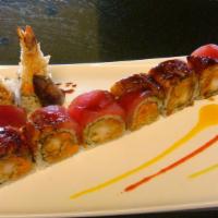 Kamikaze Roll · Shrimp tempura and spicy tuna inside. Topped with tuna and eel.
