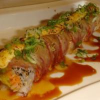 Hanky Panky Roll · Spicy tuna and avocado inside. Topped with seared tuna and mayonnaise, served with miso eel ...