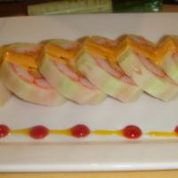 Bomb Roll · Lobster tail tempura and crab rolled thinly sliced cucumber. Served with spicy sauce.