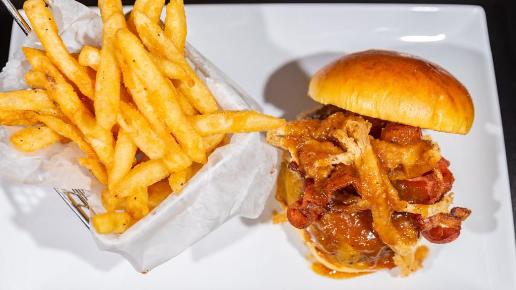 Jamagrille Appleton Burger · With tangy rum glaze, applewood smoked bacon & crispy onion. Served with french fries