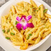 Rasta Pastal · Comforting and spicy in just the right way. Rasta pasta has a hint of island spice in a crea...