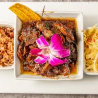 Oxtail · Jamaican oxtail is fall off the bone tender and full of amazing flavor slow cooked on a wood...
