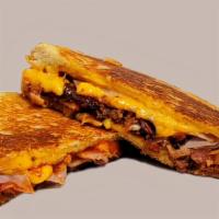 Here Piggy Piggy · Cheddar, bacon, sliced ham, pulled pork, BBQ sauce on sourdough bread includes of lays potat...