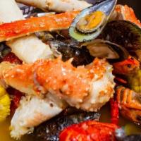 Dinner Combos -  5 · King Crab Legs, Crawfish, Green Mussels, 9 Pork  Sausage, 6 Red Potatoes, 3 Corns