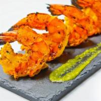 Prawn Aftabi · tiger grilled shrimp prepared with tumeric & mixed spices and topped with lemon juice